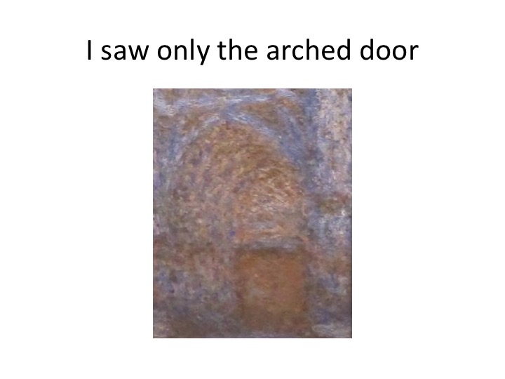 What she actually saw — the curved archway above the door, dappled with pastel colour.