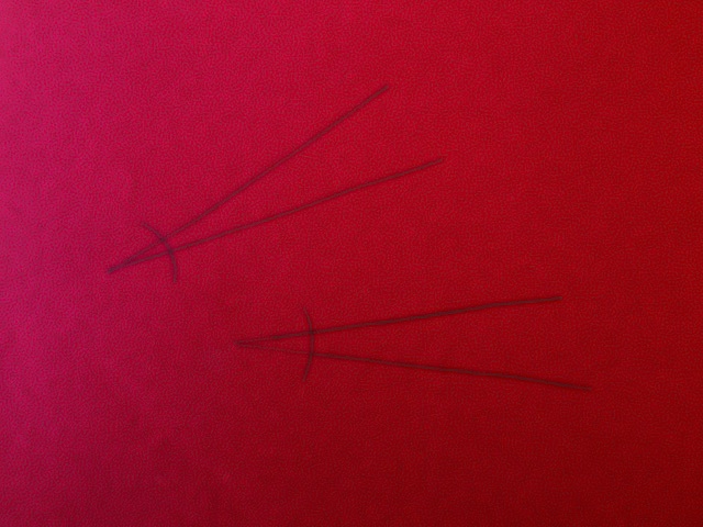 The angles, seen again in the costume.