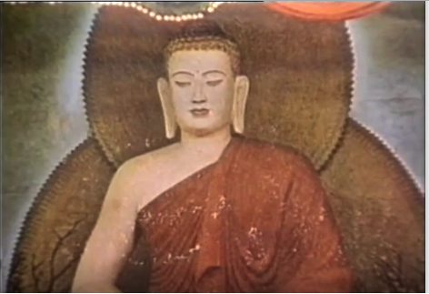 The target — a giant Buddha with lit candles and offerings.